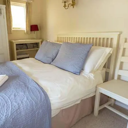The Coach House, *