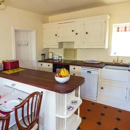 The Coach House, *